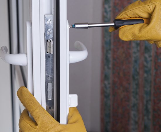 master of installation and repair of door locks at work